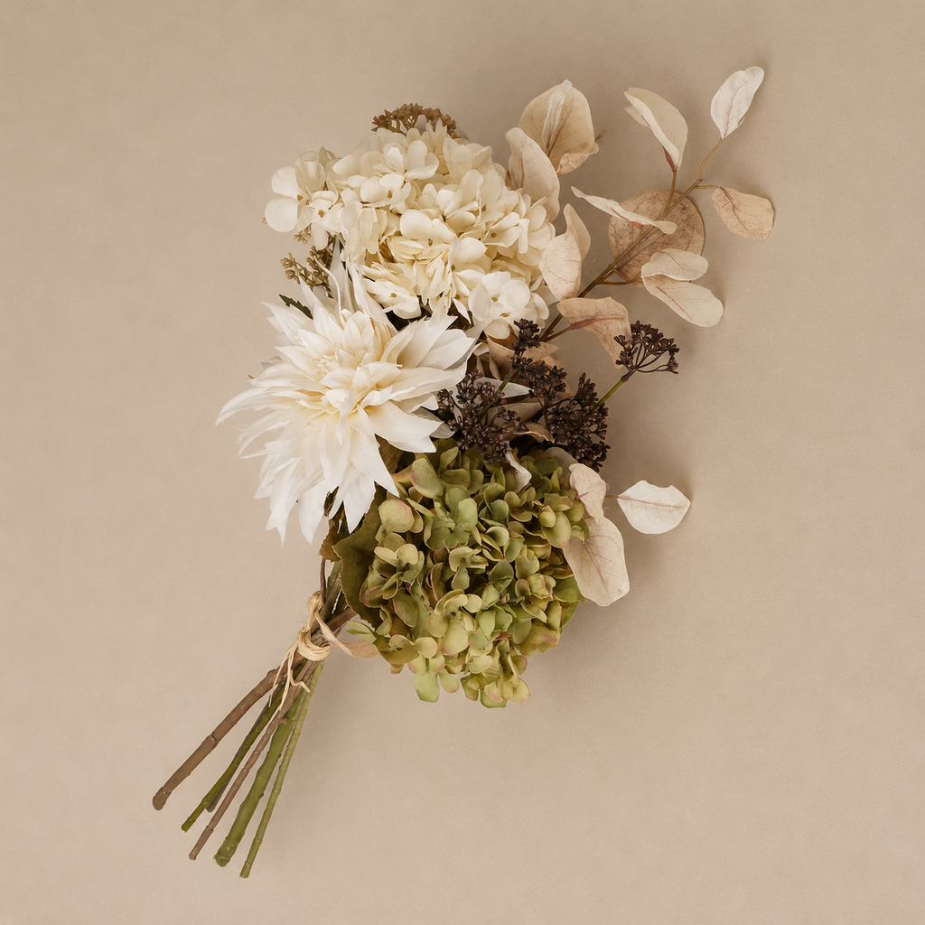 Bouquet of flowers with white, green, and beige tones on a beige background