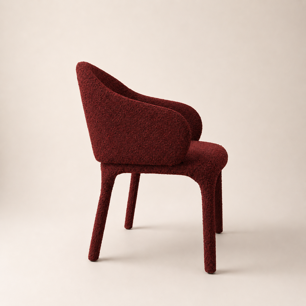 Red textured chair on a beige background