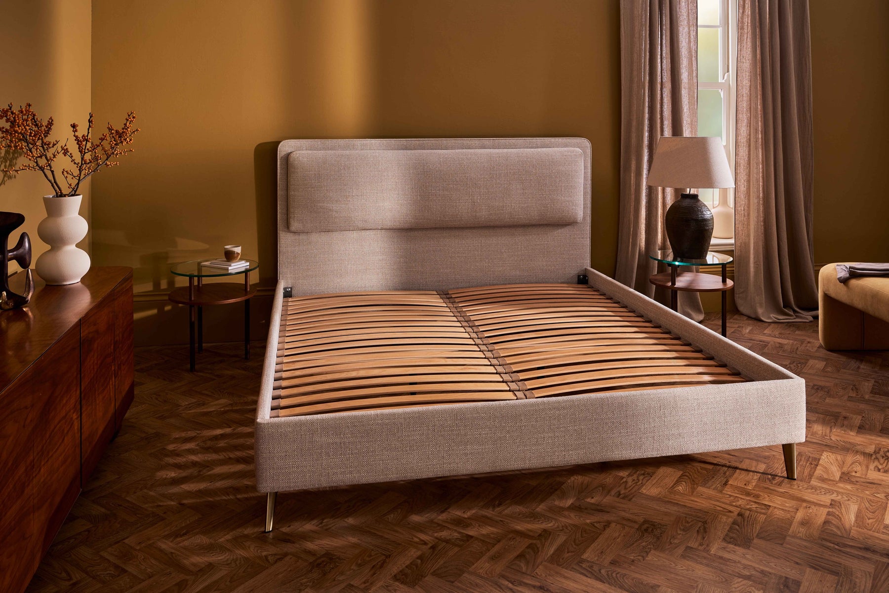 The Vispring divan base and slatted timber frame, in place