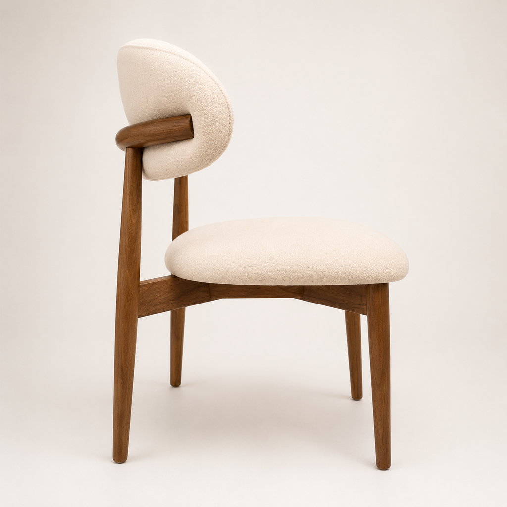Chair with wooden frame and beige cushion on a white background