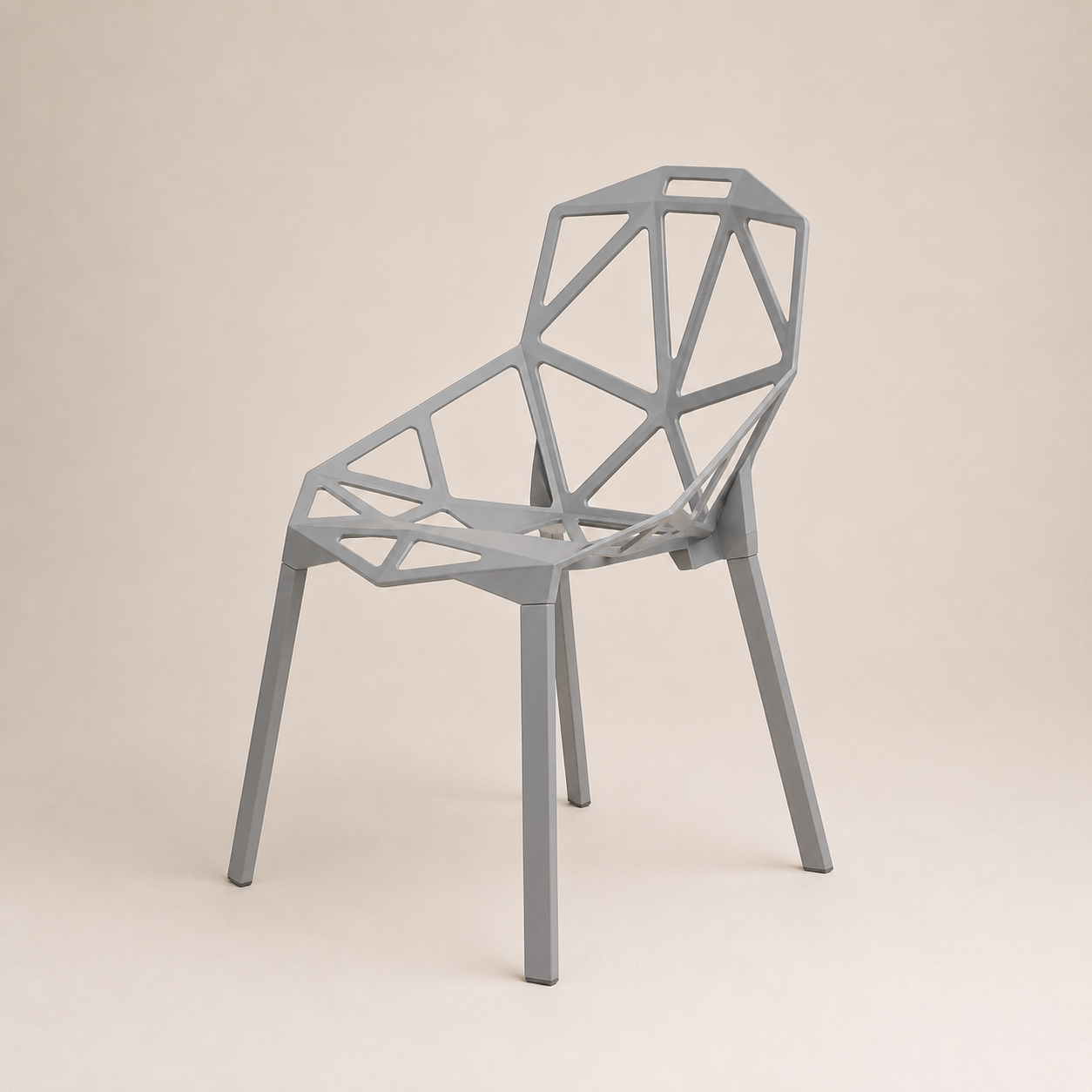 Modern gray chair with geometric design on a beige background