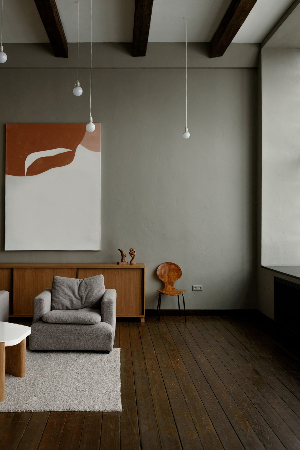 A curated living space in neutral tones and natural light