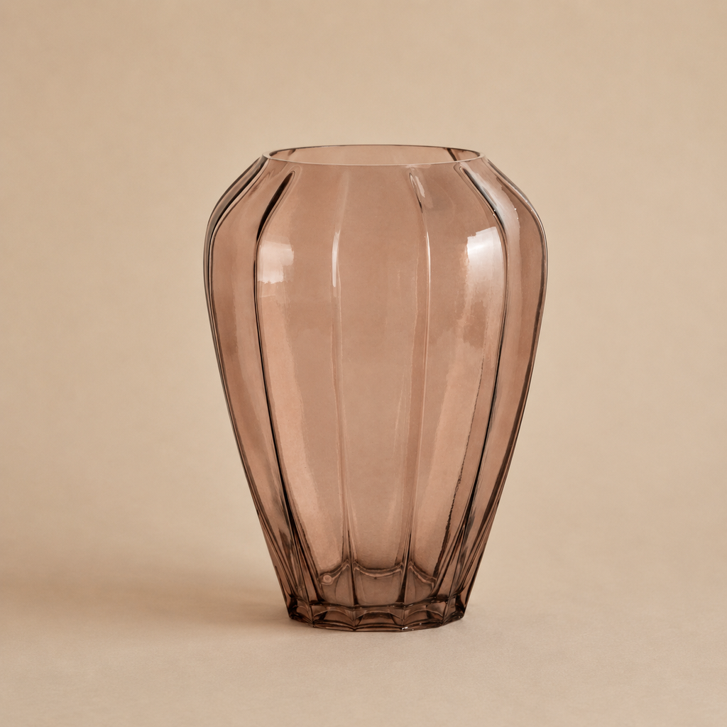 Brown glass vase on a beige background