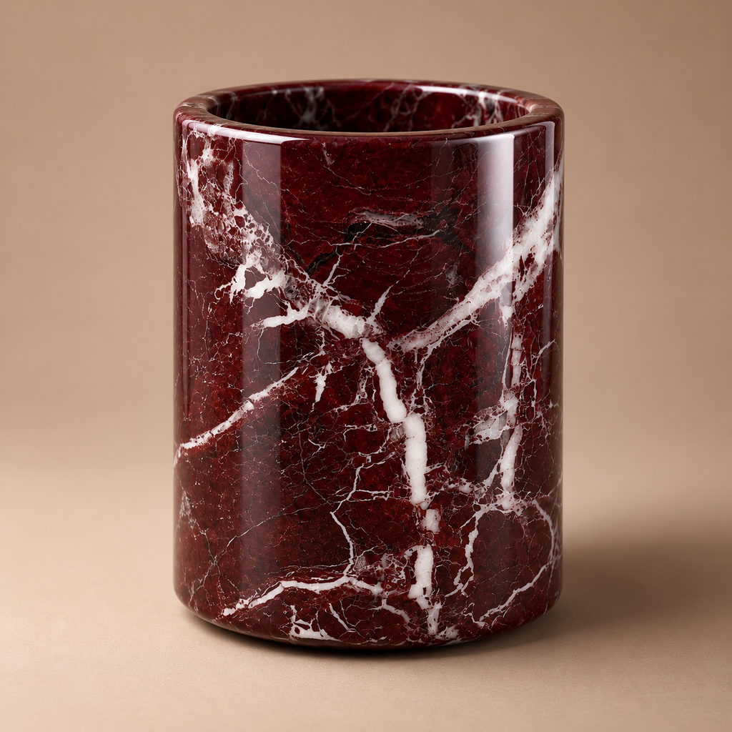 Maroon marble-patterned cylindrical container on a beige background