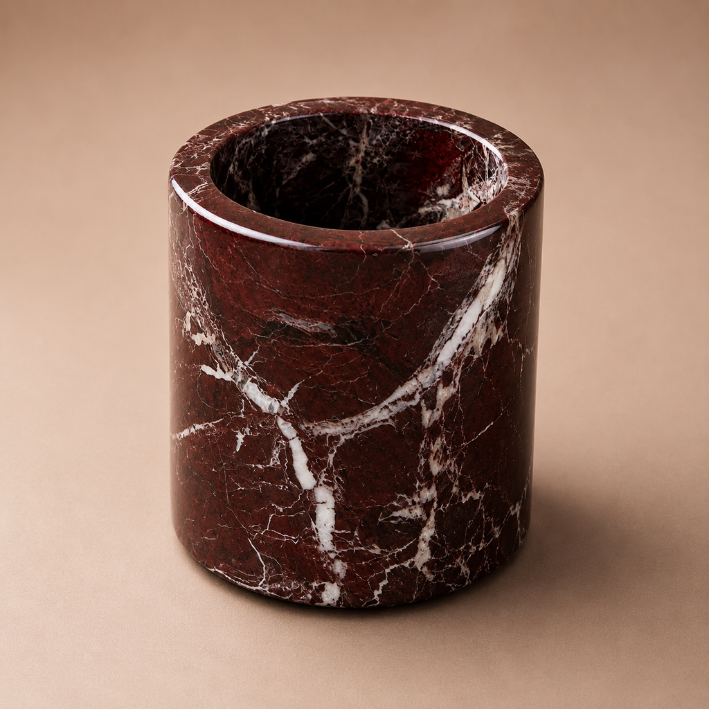Marble-patterned cylindrical container on a beige background
