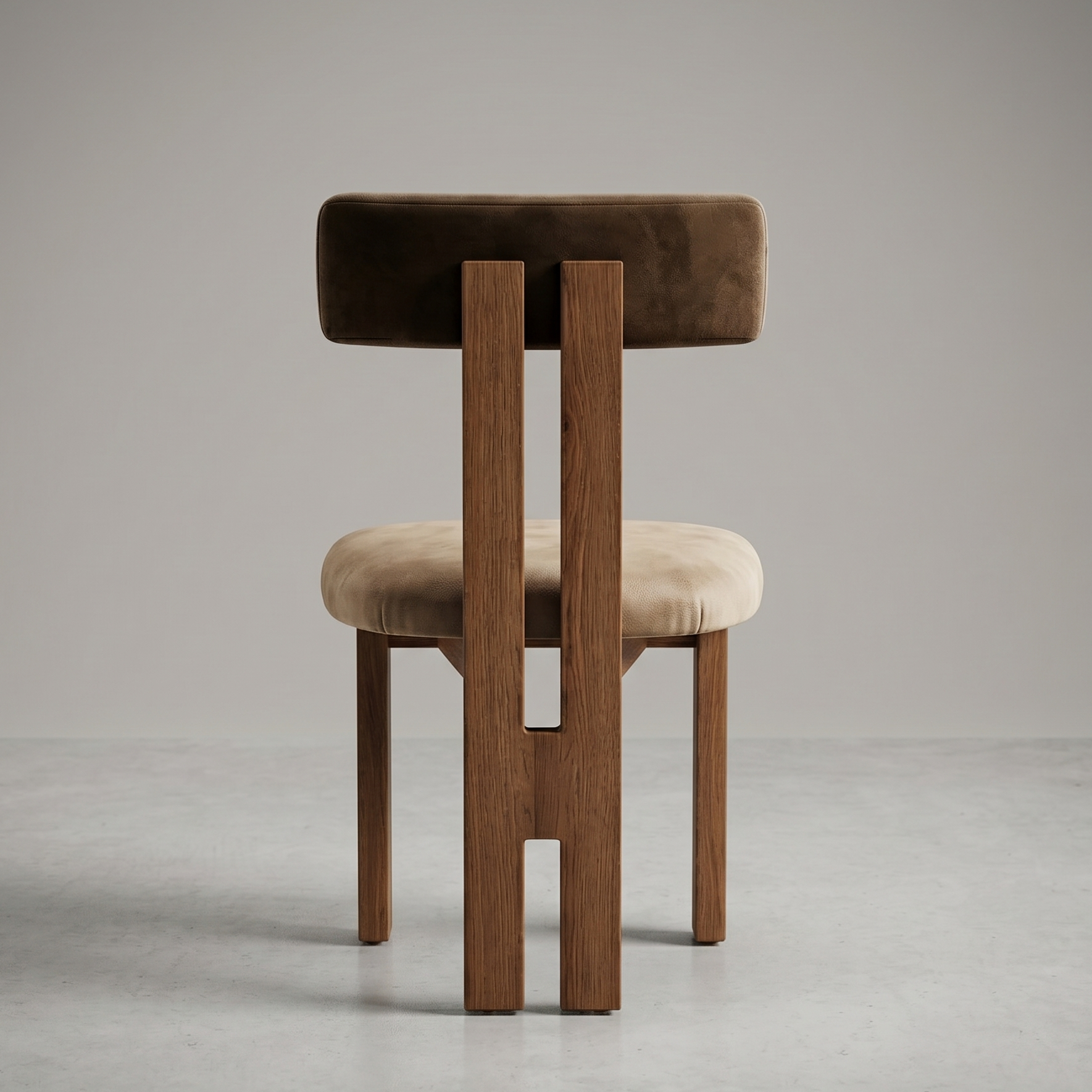 Chair with wooden frame and brown cushioned seat and backrest on a gray background